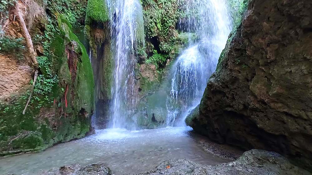 Salto de Agua Arroyo del Alcazar twin waterfall curtains over moss-covered limestone into plunge pool, Durcal, Granada, Spain