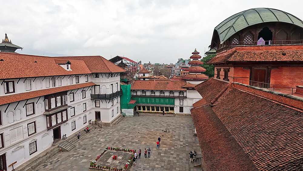 Elevated pan over the courtyards and tiered towers of Hanuman Dhoka palace, Kathmandu, Nepal