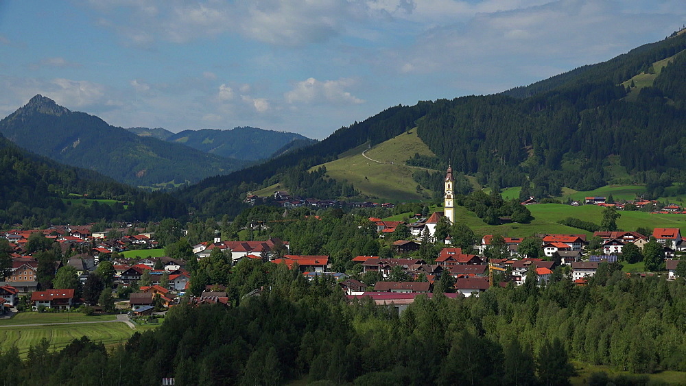 View towards the Town of Pfronten, Allgaeu, Swabia, Bavaria, Germany