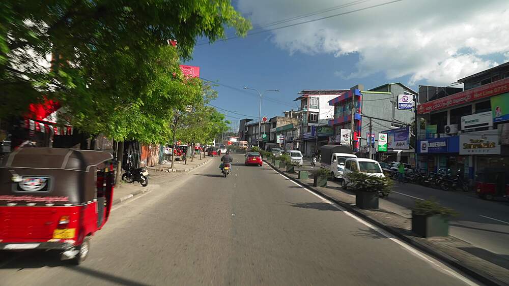 View travelling on road through interior of Sri Lanka near Kandy, Peradeniya, Central Province, Sri Lanka, Asia