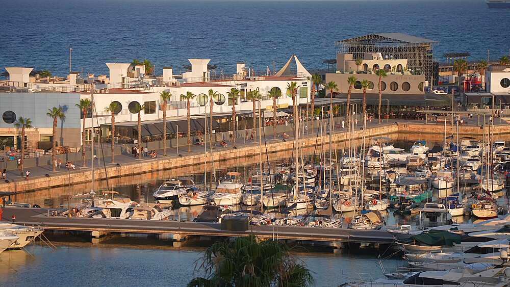 Elevated view of boats in Alicante Marina during golden hour on a sunny day, Alicante, Costa Blanca, Spain, Europe
