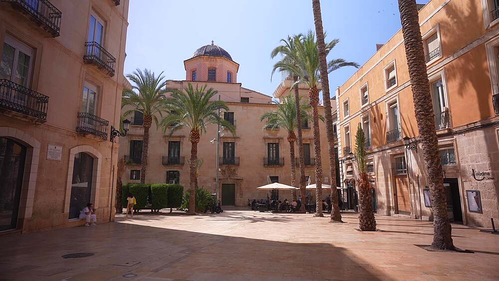 View of restaurants in Placa de la Santissima Fac on a sunny day in Alicante, Alicante, Costa Blanca, Spain, Europe