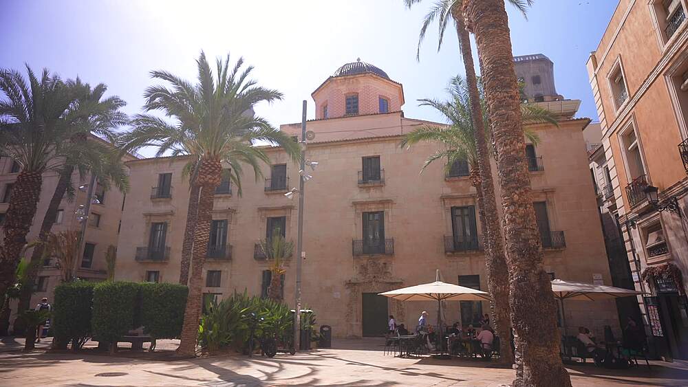 View of restaurants in Placa de la Santissima Fac on a sunny day in Alicante, Alicante, Costa Blanca, Spain, Europe