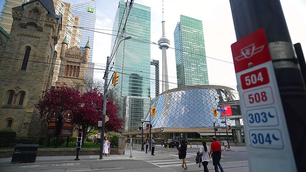 View of St. Andrew's Presbyterian Church, Roy Thomson Hall and CN Tower on a sunny day in spring, Toronto, Ontario, Canada, North America