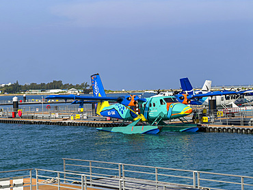 Float plane at dock in Mal, facilitating travel to islands in Maldives, smallest country in Asia