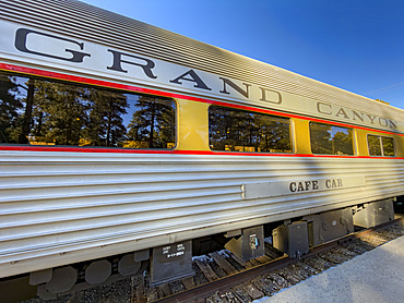 Grand Canyon Railway passenger car leaving the train depot in Williams, Arizona, USA.