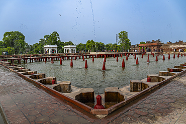 Visit to Shalimar Gardens in Lahore, Pakistan with fountains and reflecting pools creating an interesting scene