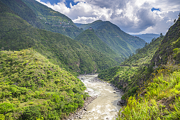 Green gorge with the Trashigang Dzong, castle in the background, Trashigang, Eastern Bhutan