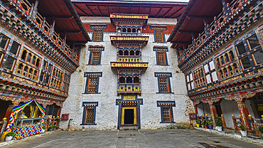 Exploring the architecture of Trashigang Dzong in Eastern Bhutan with detailed carvings and vibrant colors<br />1184-19260 Exploring the architecture of Trashigang Dzong in Eastern Bhutan with detailed carvings and vibrant colors