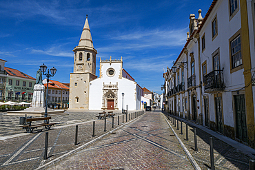 Church of Saint John the Baptist stands in Republic Square in Tomar, Portugal, showcasing its architecture and surroundings<br />1184-19277 Church of Saint John the Baptist stands in Republic Square in Tomar, Portugal, showcasing its architecture and surroundings