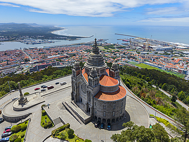 Scenic view of a building overlooking the ocean with a coastal city and harbor in Portugal