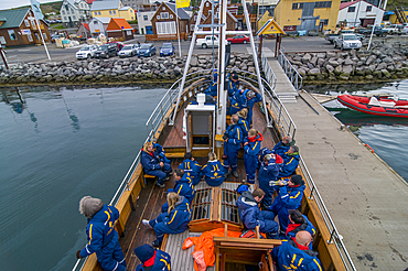 Sailing boat with passengers in harbor, Husavik, Iceland