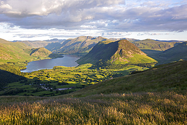 View from Low Fell over the verdant landscape of Lorton Vale to Crummock Water and Mellbreak, evening, summer, Thackthwaite, near Cockermouth, Lake District National Park, Cumbria, England, UK