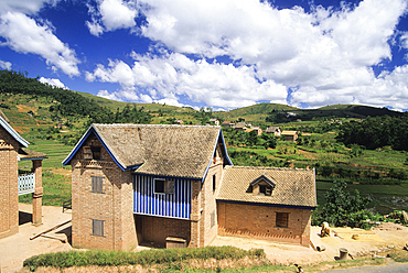 Rice drying in a village of Central Highlands, Republic of Madagascar, Indian Ocean