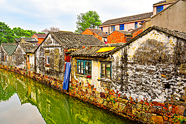 Village homes by the river at Nanfang Quan village, Wuxi City, Jiangsu Province, China