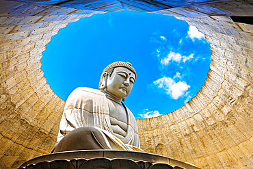 Majestic sculpture of Buddha at Hill of the Buddha (Atama Daibutsu), Sapporo, Hokkaido, Japan. This Buddhist shrine is a stunning piece of contemporary art located within the Makomanai Takino Cemetery.