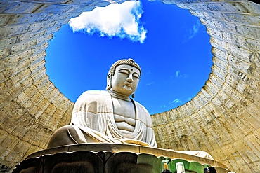 Majestic sculpture of Buddha at Hill of the Buddha (Atama Daibutsu), Sapporo, Hokkaido, Japan. This Buddhist shrine is a stunning piece of contemporary art located within the Makomanai Takino Cemetery.