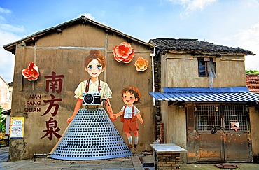 Murals and local architecture in Nanfang Quan village, Wuxi City, Jiangsu, China showcasing a colorful scene
