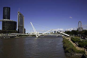 View of Neville Bonner Bridge over Brisbane River with city skyline on a clear day in Queensland
