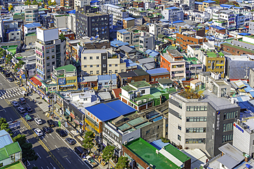 View of buildings in Dongdaemun District during autumn under clear skies in Seoul, South Korea