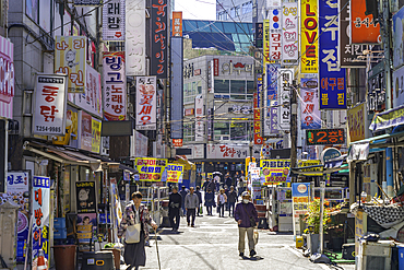 View of street with signs on a sunny day, Chungmu-daero, Seo-gu, Busan, South Korea, Asia