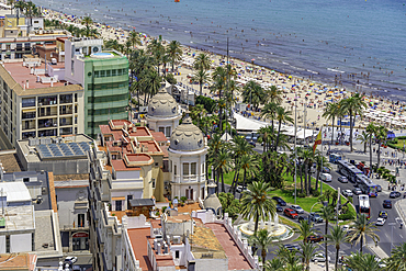 Elevated view of beach and town on sunny day in Alicante, Spain