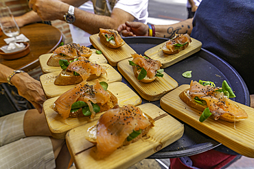 View of Tapas presented on wooden plates, Alicante, Costa Blanca, Spain, Europe