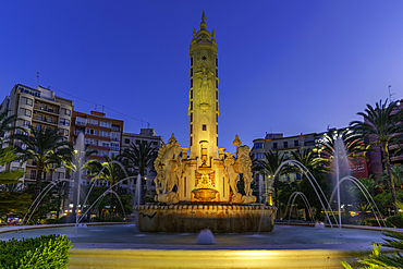 View of 'Font of East' Fountain in Placa Dels Estels at dusk in Alicante, Alicante, Costa Blanca, Spain, Europe
