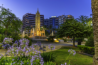 View of 'Font of East' Fountain in Placa Dels Estels at dusk in Alicante, Alicante, Costa Blanca, Spain, Europe