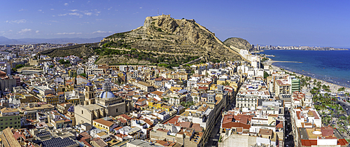 Elevated view of Castillo de Santa Barbara and the coastline of Alicante on a sunny day in Costa Blanca, Spain