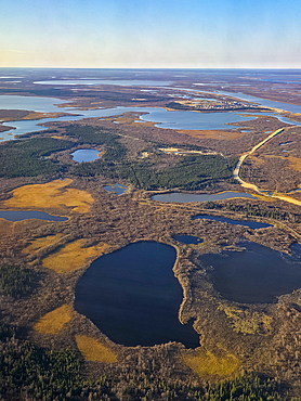 Aerial view of wetlands and lakes in the Arctic region of Russia during daylight hours in autumn