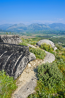 Bunker system along border in Albania offers view of landscape and mountains in the background