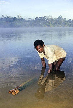 Man on the bank of the Mananjary river, Madagascar, Indian Ocean, Southeast Africa