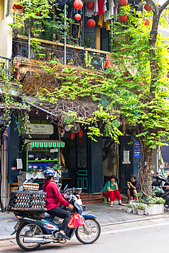 Vendor sells eggs in the Old Quarter of Hanoi throughout the day as locals go about their business<br />800-4653 Vendor sells eggs in the Old Quarter of Hanoi throughout the day as locals go about their business