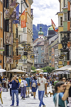 Cafes and people in Herzog-Friedrich-Strae during summer in Innsbruck, Tyrol Region, Austria