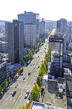 View of buildings and streets in Dongdaemun District on a sunny autumn day in Seoul, South Korea