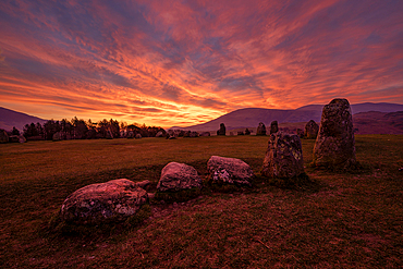 Incredible sunrise lights up the stones at Castlerigg Stone Circle in Lake District, Cumbria, United Kingdom