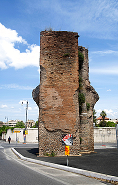 Remains of Neroniano Acqueduct stand as a historical landmark in the streets of Rome, showcasing ancient Roman architecture